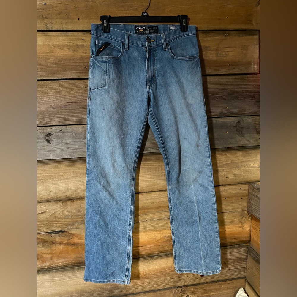 32/34 faded ariat jeans